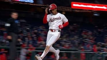 Daylen Lile scores on a wild pitch