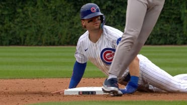 Nico Hoerner steals second base