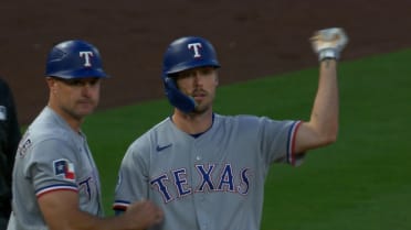 Evan Carter's two-run triple