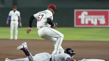 Nolan Jones reaches with a single after review