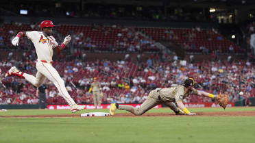 Jordan Walker is safe at first after review