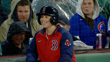 Ball girl reaches to make a nice catch