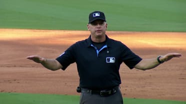 Austin Hedges safe at first after review