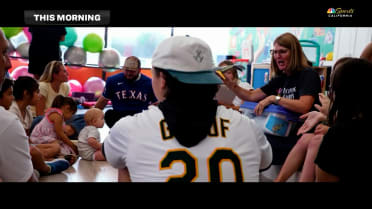 Athletics visit children at GiGi's Playhouse