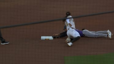 Edouard Julien steals second base after review