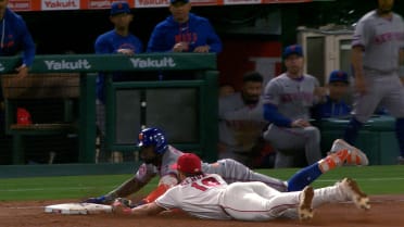 Ronny Mauricio is safe at first after a review