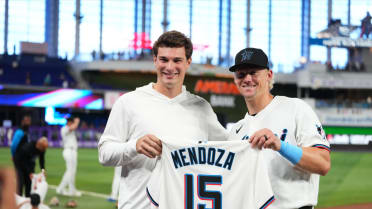 Fernando Mendoza throws out ceremonial first pitch
