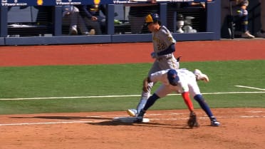 Yelich confirmed safe at first after challenge