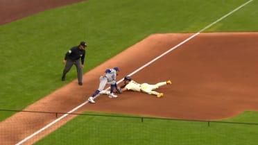 Isaac Collins safe at third base after review