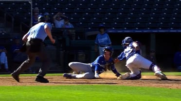 Braylin Morel throws out Nolan Sailors at home