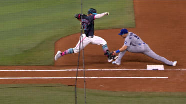 Heriberto Hernández safe at first after review