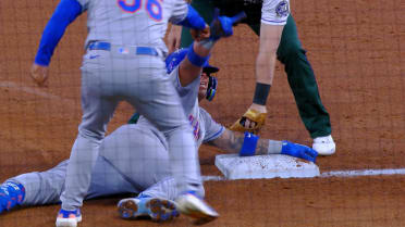 Alvarez out at third on review