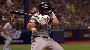 Austin Hedges is hit by a pitch following review
