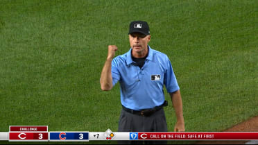 Dansby Swanson is out at first base after review