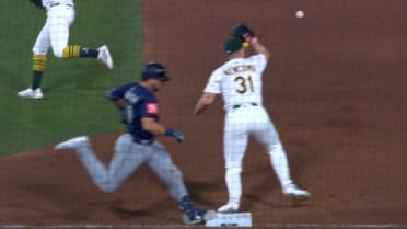 Cal Raleigh safe after challenge