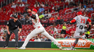 Alec Burleson nabs TJ Friedl at first after review