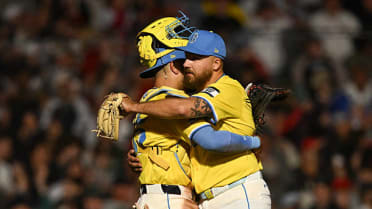 Greg Weissert records the save