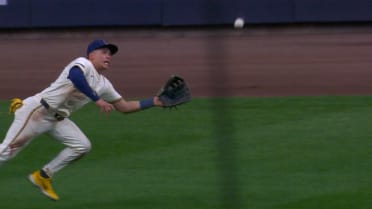 Isaac Collins lays out to make a diving catch