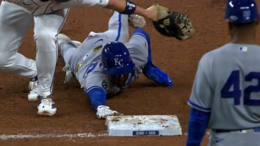 Tyler Tolbert is safe at first after review