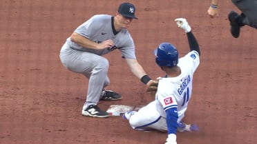 Trent Grisham throws out Maikel Garcia after review 