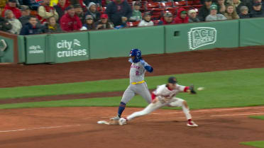 Luisangel Acuña beats out a single after review