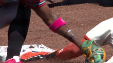 Casey Schmitt steals second after review