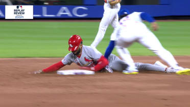 Victor Scott II steals second after review