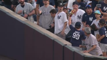 Austin Wells hits a double on fan interference