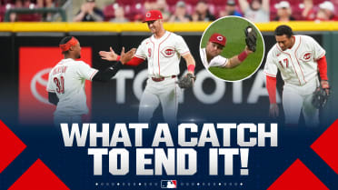 Matt McLain hangs on for final out