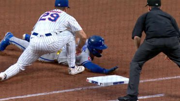 Luis Torrens picks off Isaac Collins after review