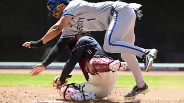 MJ Melendez scores with a creative slide