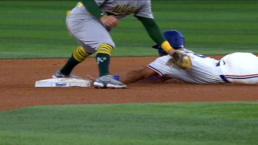 Marcus Semien is safe at second base after review