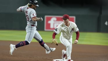 Pavin Smith holds the bag for the out after review