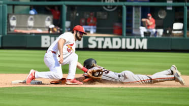 Cox is caught stealing after a Cardinals' challenge