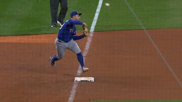 Josh Naylor reaches third base after challenge