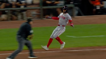 Ceddanne Rafaela safe at first after a review