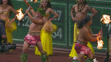 Polynesian dancers perform before the game