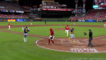 Garrett Mitchell scores on wild pitch