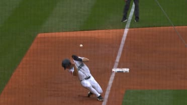 Leo Rivas ducks out of the way of a foul ball