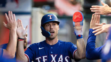 Evan Carter scores on an RBI walk