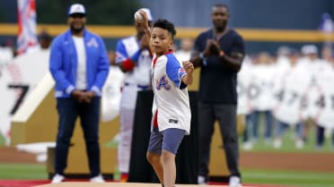 King Aaron tosses out the ceremonial first pitch