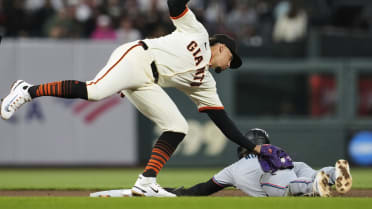 Connor Norby steals second base after review