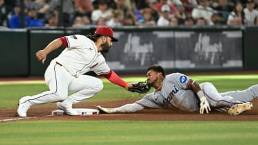 Dane Myers safe at third after review