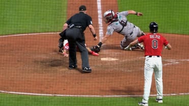 Steven Kwan hits a two-run single after review