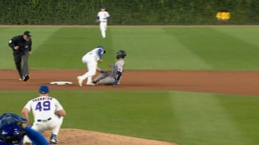 Carson Kelly catches Ali Sánchez stealing second base