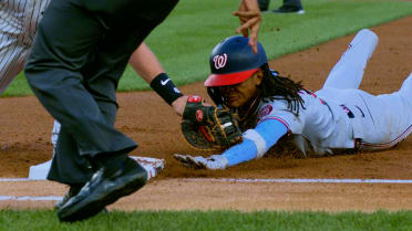 Austin Wells picks off Abrams at first after review