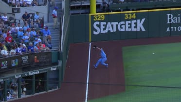 Matt Thaiss reaches on an error after review