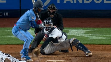 Yovanny Cruz throws a ball after review