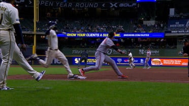 Brice Turang safe at first after review