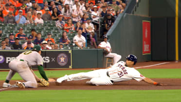 Carlos Cortes throws out the runner at third